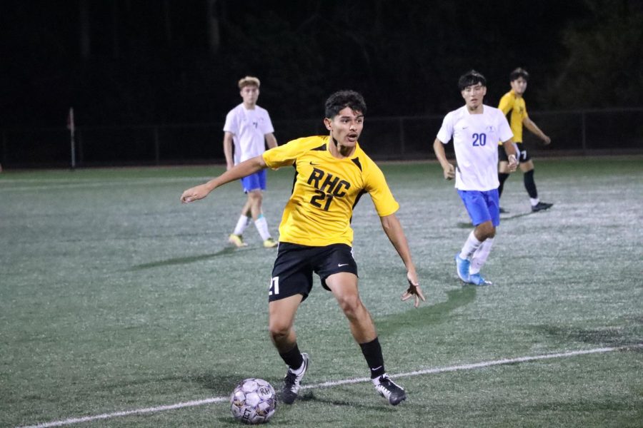 #21 Ruben Gonzalez dribbles the ball towards Cerritos' goal on October 18, 2022. 