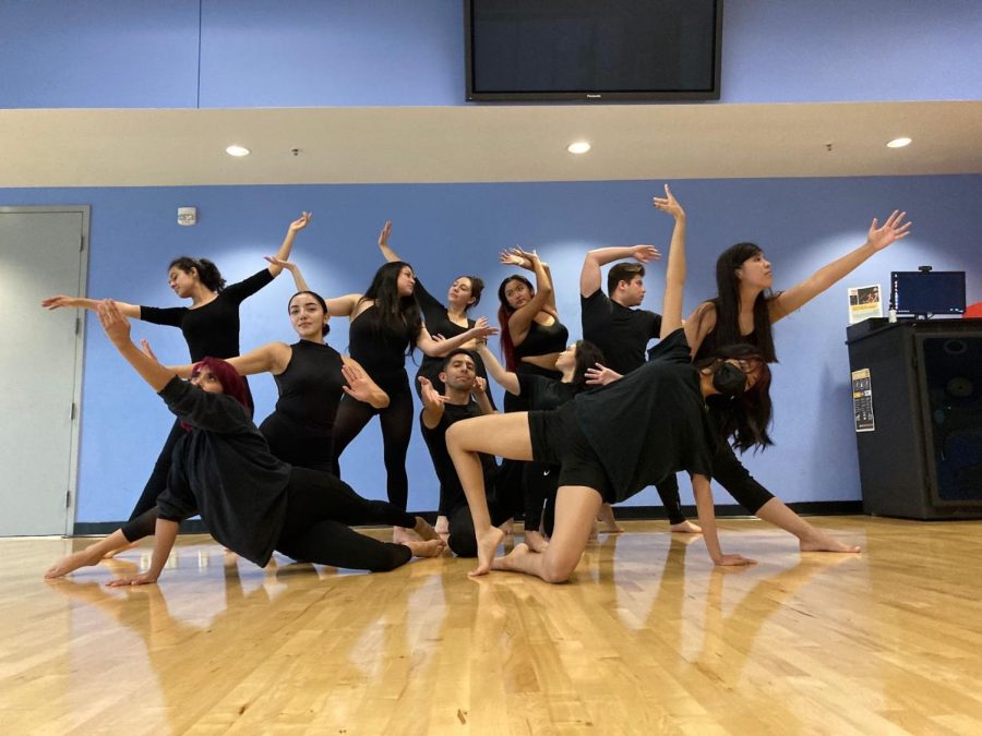 From left to right, Jasmine Duarte, Susanna Reyes, Nadine Gomez, Rostia Rico, Tori Lopez, Ray Melendez, Angelina Martinez, Yvonne Bell, Andy garcia, Arlene Rivera and Arely Cazimiro rehearsing for “In Motion.”
