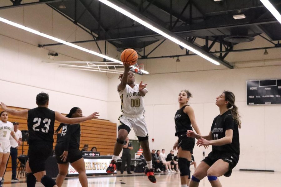 #10 Tiah Sherman goes up for a tough layup in Wednesday's playoff. contest against College of the Canyons.