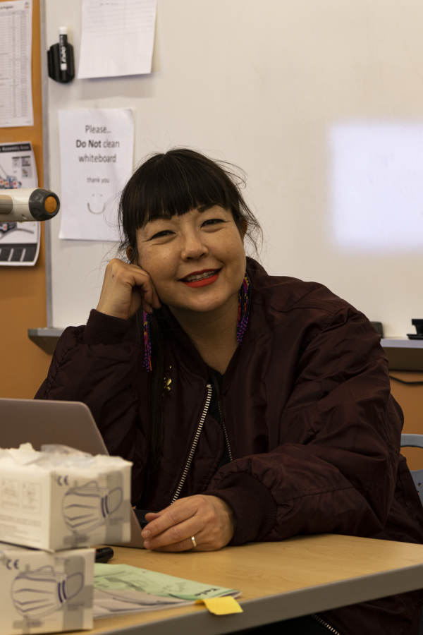 Erin Miyo Stevens-Gandara (pictured above) grading some of her students work right after class.