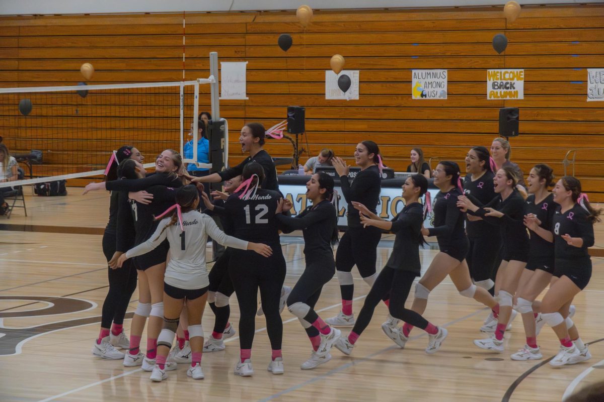 Lady Roadrunners storming the court after 3-1 victory against cerritos college.