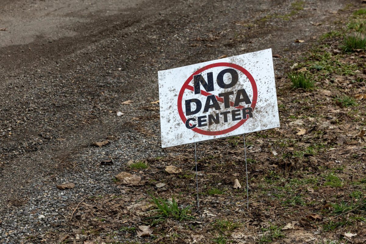 A sign that reads "No data center" sits outside a home in New Carlisle, Indiana, U.S., March 23, 2026. REUTERS/Jim Vondruska