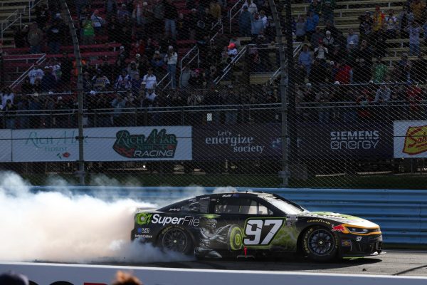 May 10, 2026; Watkins Glen, New York, USA; NASCAR Cup Series driver Shane Van Gisbergen (97) celebrates after winning the Go Bowling at The Glen at Watkins Glen International. Mandatory Credit: Matthew O'Haren-Imagn Images